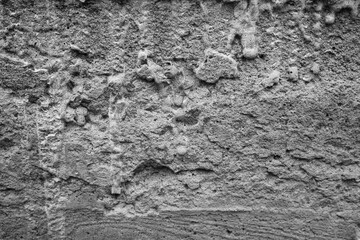 Textured surface revealing intricate patterns of weathered concrete