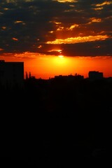 Fototapeta premium City silhouette. Sunrise. Cloudy sky. Красочная фотография. Обложка. Об'ртка. Обои. Фон.