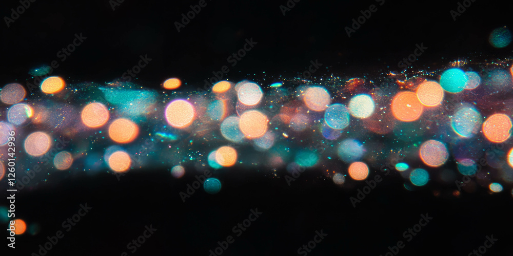 Poster Large bokeh circles create a stunning visual effect with vibrant hues and sparkles set on black