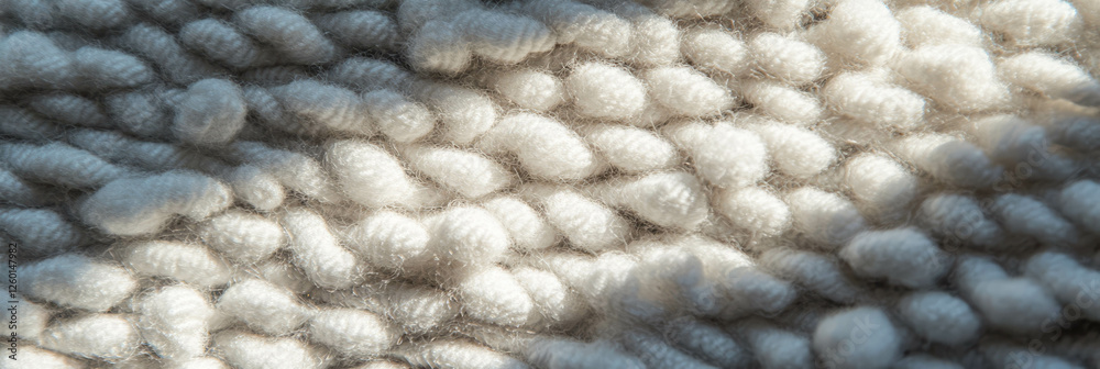 Poster light gray dense berber carpet showcasing subtle texture and looped pile detail