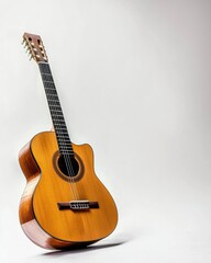 Naklejka premium Charming Small Wooden Guitar Perfectly Placed on a Clean White Surface for Minimalist Design Enthusiasts
