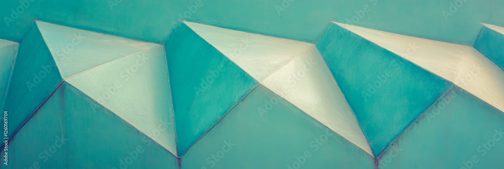 Poster Overlapping triangular pattern with muted blues and a modern design enhancing interior aesthetics