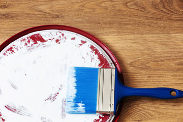 brash and white paint on floor