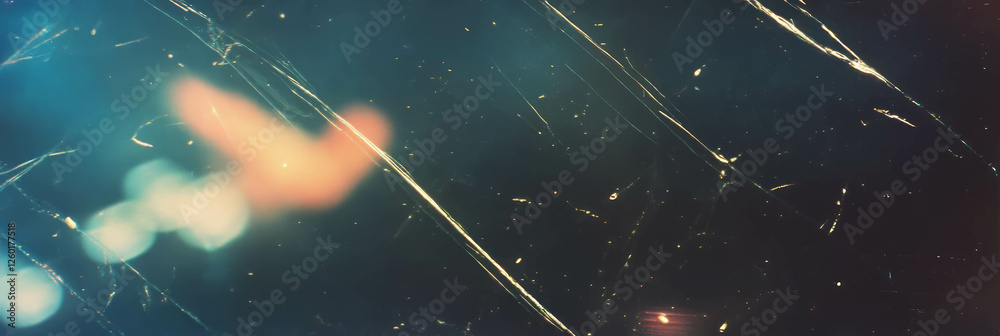 Poster visual representation of scanned film texture with fine scratches and grain effect
