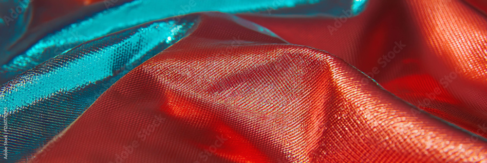 Poster shiny nylon and chrome textures combined with vibrant clay elements in sports fabric setting