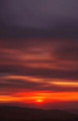 Sunset views with abstract blurred colors blending in a soft focus natural landscape