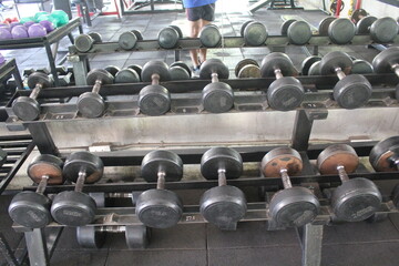 A gym is a facility equipped with exercise machines, free weights, and fitness areas designed for...