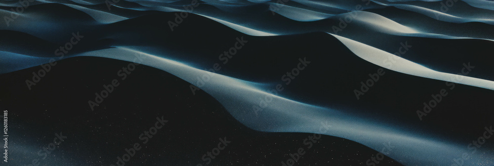 Aufkleber smooth black sand dunes with gentle curves and windblown patterns create a serene landscape