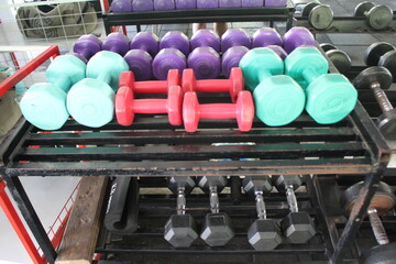 A gym is a facility equipped with exercise machines, free weights, and fitness areas designed for...