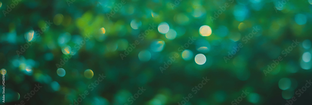 Aufkleber textured background of sparse bokeh with gentle light reflections and green hues