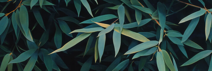 Fototapeta premium Stylized bamboo leaf pattern creates a soothing dark green ambiance in decorative textiles