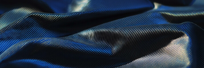 Naklejka premium Woven ripstop nylon fabric showcasing texture and sheen in a dynamic arrangement