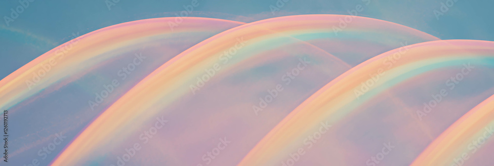 Poster colorful tiny rainbows with gentle arcs create a whimsical background for a banner