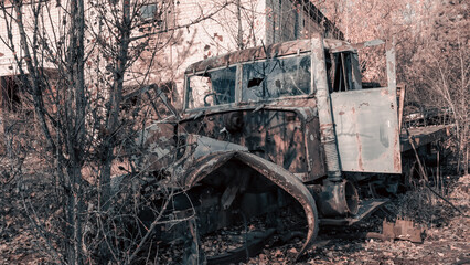 Fototapeta premium broken truck near an abandoned building in Chernobyl