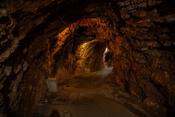Pedestrian tunnel through a rock or mountain near Petrovac town in winter time, Montenegro