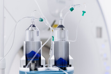 Close-up of a contrast agent before diagnostics in a CT room. The concept of using innovative...