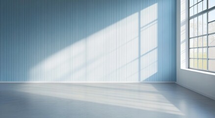 Sunlight shines through the window into the interior space with blue walls and wooden floor