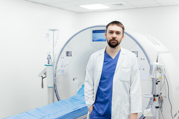 Portrait of attractive male doctor radiologist friendly smiling, wear white blue uniform against...