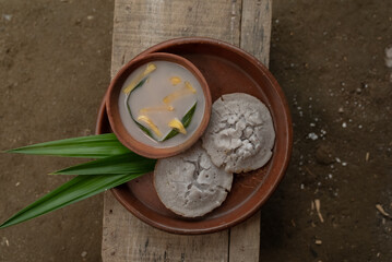 Traditional pancakes sprinkled with small pieces of jackfruit and sweet coconut milk. Unique traditional Indonesian pancakes
