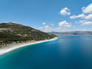 Aerial drone panorama landscape of Lake Salda (Aka Turkish Maldives) and its turqoise waters, Burdur, Turkey