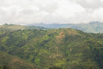 Obraz premium The natural landscape of the rural area in Aileu Municipality in Timor Leste is dominated by mountainous and hilly areas with dense tropical forests.