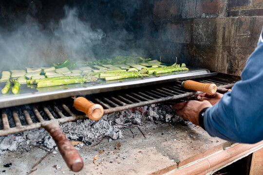 Barbecue of green peppers, zucchini and green asparagus. Outdoor smoked grill. BBQ. Horizontal image.