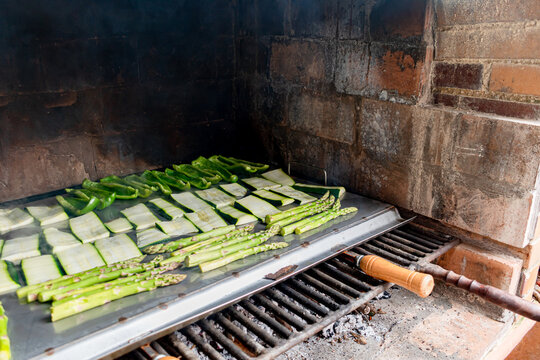 Barbecue of green peppers, zucchini and green asparagus. Outdoor smoked grill. BBQ.

