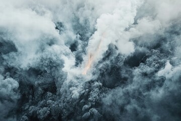 Obraz premium Aerial view of volcanic eruption spewing ash and smoke, showcasing the raw power of nature in a dramatic display.