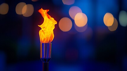 Burning torch, night event, bokeh background, festive illumination