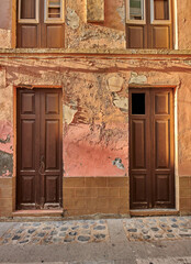 Architecture, building and wooden door outdoor on city streets Santa Cruz, La Palma in Spain. Old, rundown and vintage with architectural landmark in Europe for holiday, travel or vacation abroad
