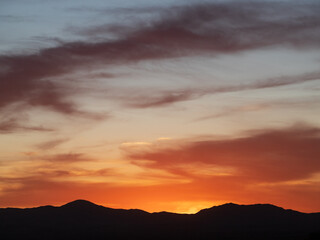 Tucson Arizona Sunset Sky and Mountains Silhouette Background with copy space