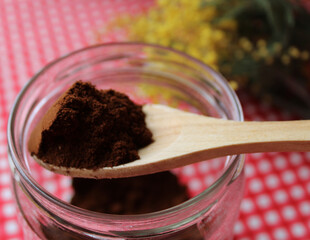 Coffee in spoon, ground coffee