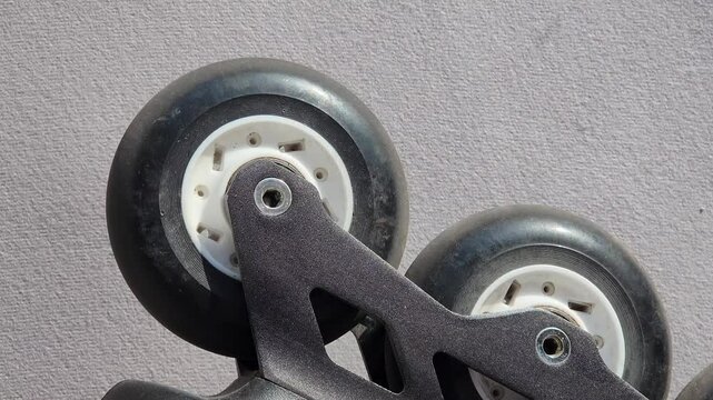 the wheels of an inline skate close up.
