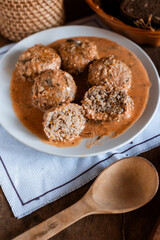 meatballs in tomato sauce, Ukrainian cuisine, rustic style, cutlets with sauce, cozy light still life, lunch, home cooking