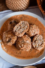 meatballs in tomato sauce, Ukrainian cuisine, rustic style, cutlets with sauce, cozy light still life, lunch, home cooking