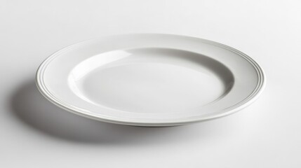 Elegant white serving plate ready for culinary presentation ideal for food photography and culinary blogs showcasing sophisticated dining.