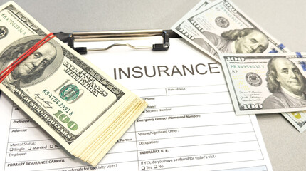 A close-up image of health insurance form on a clipboard. Medical and insurance concept.
