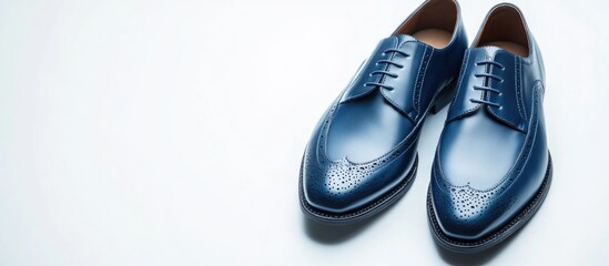 Stylish blue leather men's shoes displaying intricate detailing on a clean white background perfect for fashion and retail promotions