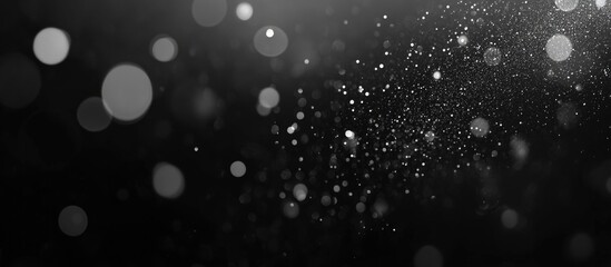 Obraz premium Silver Glittering Background with Black Bokeh Abstract for Elegant Christmas Celebrations and Holiday Designs