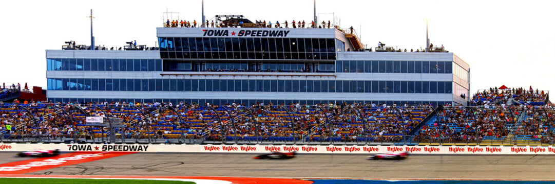 Iowa Speedway grandstand and tower with fans, during a racing event. Wide Panorama