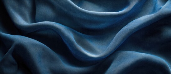 Obraz premium Elegant deep blue denim texture perfect for fashion and textile design backgrounds conveying style and sophistication.