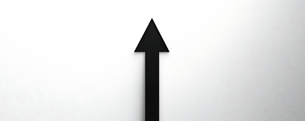 Fototapeta premium A bold black arrow with a sharp triangular head is centered on a clean white background, symbolizing direction, movement, and progress in a minimalistic design