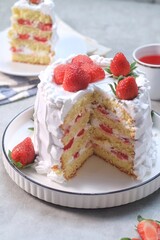 Strawberry cake, vanilla sponge cake with cream and fresh strawberries. Summer cake.
