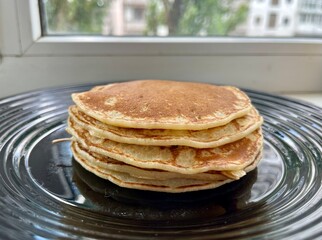 stack of pancakes with butter
