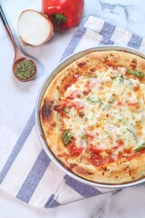pizza with sausage, paprika and sauce 