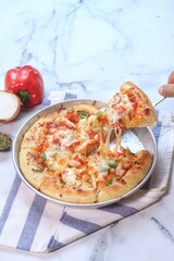 pizza with sauce, sausage and paprika 
