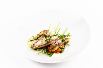 Gourmet Grilled Chicken Dish with Fresh Vegetables and Garnish