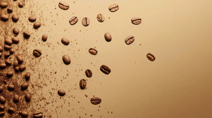 Coffee beans falling against a golden background in an artistic display