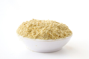 Close-up of a bowl of Besan Gram Flour, a pale yellow powder