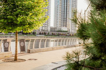 Metal bridge in a city park near a lake